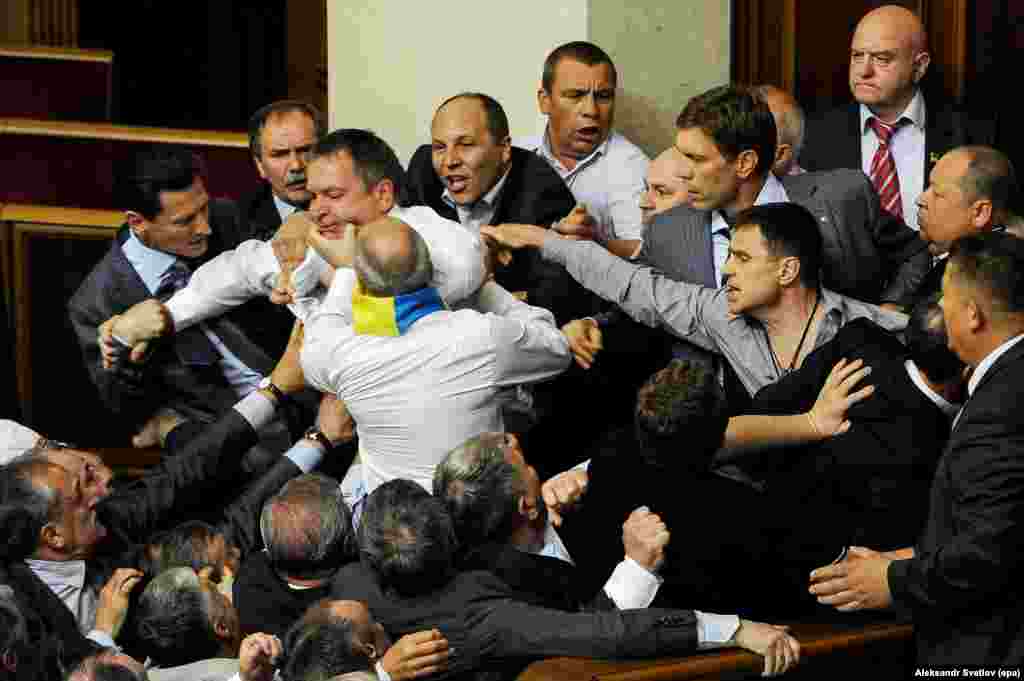 In a good candidate for the accidental renaissance&nbsp;photography genre, a brawl erupts during a debate on a Russian-language bill in March 2012.&nbsp;