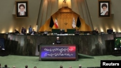 IRAN - Iranian President Hassan Rouhani speaks during a session of parliament in Tehran, September 3, 2019