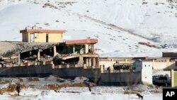 Աֆղանստանի անվտանգության ուժերը զննում են թալիբների կողմից գրոհի ենթարկված շրջանը, Մայդան Շահր, 21-ը հունվարի, 2019թ. 
