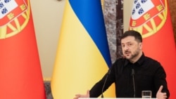 Ukraine's President Volodymyr Zelenskyy speaks during a joint press conference with Portugal's Prime Minister Luis Montenegro (unseen) in Kyiv on December 20, 2025.