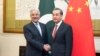 Chinese Foreign Minister Wang Yi (R) shakes hands with Pakistan Foreign Minister Khawaja Muhammad Asif (L) at Diaoyutai State Guesthouse on September 8, 2017 in Beijing, China