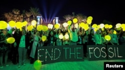 Protest al activiștilor ecologiști la Conferința ONU privind schimbările climatice COP28 din Dubai, Emiratele Arabe Unite, 11 decembrie 2023