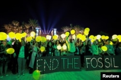 تجمع فعالان محیط زیست در دفاع از پایان دادن به سوخت‌های فسیلی در حاشیه کاپ۲۸