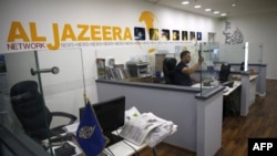 Сотрудник катарской новостной сети и телеканала «Аль-Джазира» в иерусалимском офисе канала. Июль 2017 года.