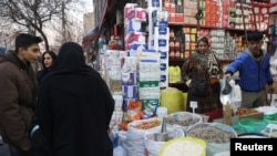 An Iranian woman shops in a local market in Tehran. (file photo)