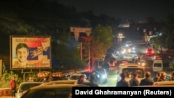 Residents use vehicles to leave Stepanakert following a military operation conducted by Azerbaijani armed forces in Nagorno-Karabakh, September 24, 2023.