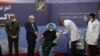 Hamed Fakhrizadeh megkapja a Fakhra vakcinát Teheránban, 2021. március 16-án.