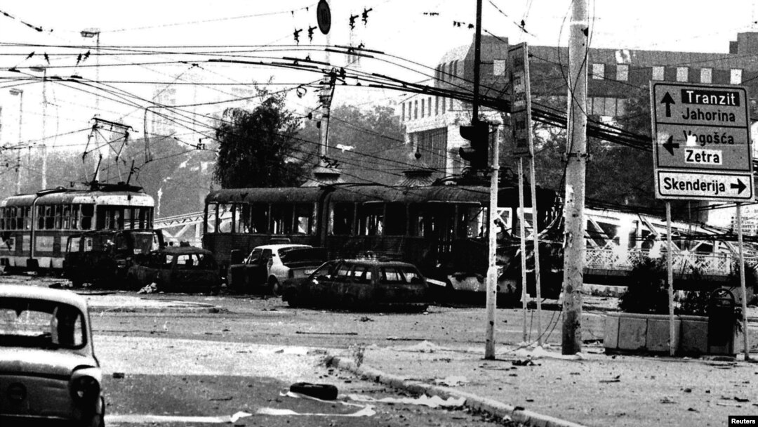 Burned trams and cars in the center of Sarajevo after heavy shelling by Bosnian Serb forces in May1995