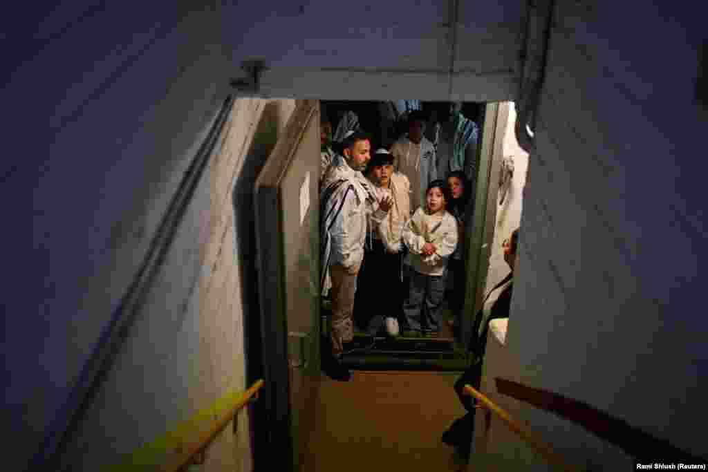 Israelis shelter underground after missiles were launched from Iran towards the city of Haifa.