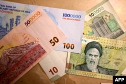 Иранские банкноты номиналом один миллион, 500 000 и 100 000 риалов