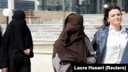 Women repatriated to Kosovo from Syria leave the Basic Court in Pristina on April 23, 2019.