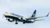 Belgium -- A Boeing 737-8AS airplane of Irish low-cost carrier Ryanair approaches for landing at Brussels National Airport, April 21, 2017.