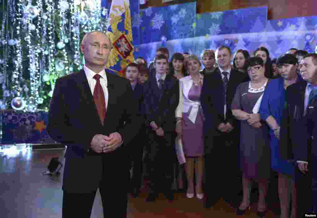 Președintele rus Vladimir Putin a rostit mesajul de Anul Nou la Habarovsk, în estul Rusiei, 31 decembrie 2013. 