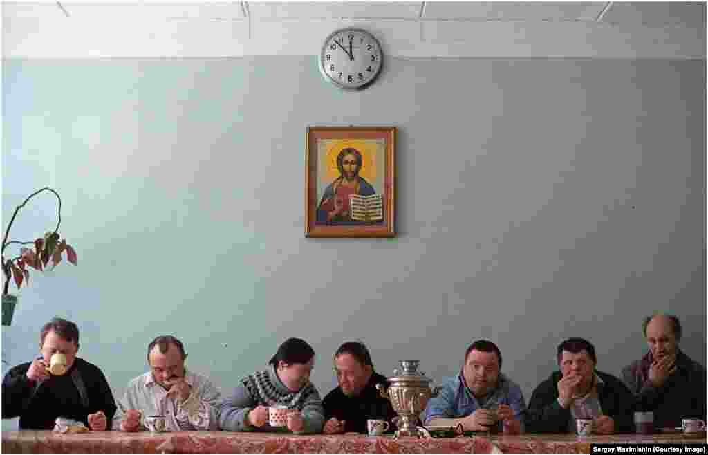 Intellectually disabled actors of the Naive Theater drinking tea in St. Petersburg, 2005