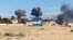Дым от взрывов на военном аэродроме в поселке Новофедоровка вблизи города Саки в оккупированном Крыму, 9 августа 2022 года
