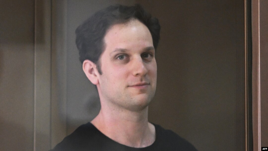 Evan Gershkovich appears in court in Moscow in June.