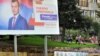 Election posters on the main street of the eastern Bosnian town of Srebrenica