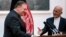 Afghan President Ashraf Ghani (right) and Secretary of State Mike Pompeo shake hands following a news conference at the Presidential Palace in Kabul in July.