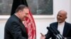 Afghan President Ashraf Ghani and Secretary of State Mike Pompeo shake hands following a news conference at the Presidential Palace in Kabul, Afghanistan July 9, 2018