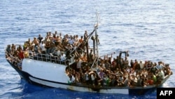 World -- photo released by French authorities of fishing boat carrying around 300 illegal migrants in Mediterranean Sea before 24sep2008