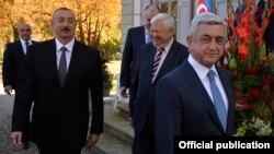 Switzerland - Presidents Serzh Sarkisian (R) of Armenia and Ilham Aliyev of Azerbaijan begin negotiations in Geneva, 16Oct2017.