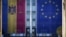 Giant flags of Moldova and EU are seen on the Government buildings in Chisinau September 26, 2025 ahead of parliamentary elections.