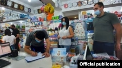 Armenia -- Officials from Armenia's Health and Labor Inspectorate inspect a supermarket in Yerevan to verify its compliance with coroanvirus safety rules, July 22, 2020.