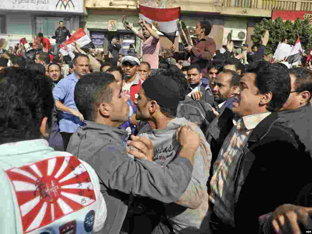 Pro- and anti-Mubarak demonstrators face off in Cairo's Tahrir Square, minutes before clashes started.