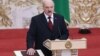 Belarusian President Alyaksandr Lukashenka takes the oath of office during an inauguration ceremony in Minsk on November 6.