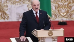 Belarusian President Alyaksandr Lukashenka takes the oath of office during an inauguration ceremony in Minsk on November 6.