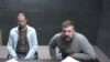 Aleksandr Chikalo (left) and Ivan Bliznyuk participate in a Buenos Aires court hearing via video link from Marcos Paz prison in June 2021.