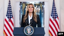 US First Lady Melania Trump speaks about communication with Russian President Vladimir Putin regarding the fate of Ukrainian children, in the Grand Foyer of the White House in Washington, DC, on October 10, 2025. (Photo by SAUL LOEB / AFP)