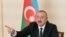 AZERBAIJAN -- Azerbaijani President Ilham Aliyev gestures as he speaks during an address to the nation in Baku, October 26, 2020