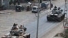 Turkish armored vehicles close tro the Iraqi border