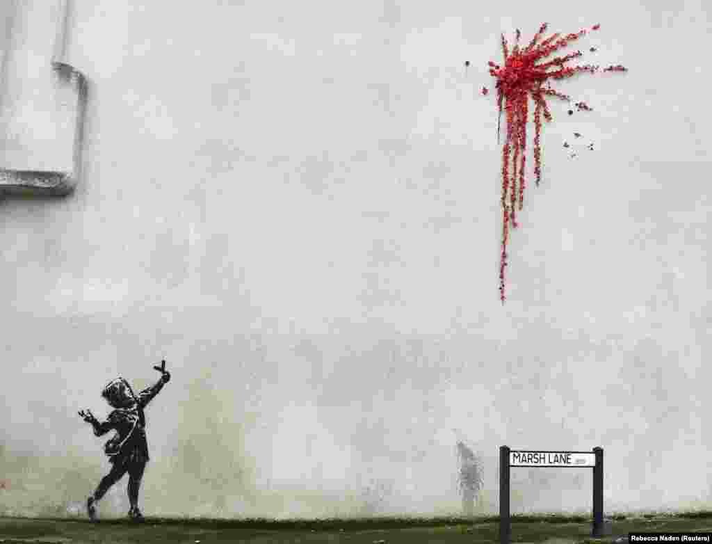 A suspected new mural by the artist Banksy appeared in Marsh Lane in Bristol, United Kingdom on February 13. (Reuters/Rebecca Naden)