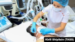 A man who drank a bath lotion called Boyaryshnik (Hawthorn) receives treatment at a hospital in Irkutsk. At least 74 people have died from drinking the tainted liquid.