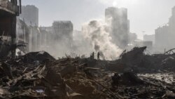 Киевта утка тотылган сәүдә үзәге хәрабәләре, 21 март 2022