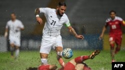 نمایی از دیدار رفت ایران و سوریه در مالزی