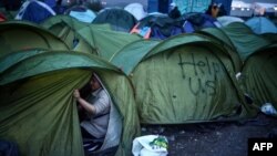 Палаточный лагерь беженцев на греческо-македонской границе. 7 марта 2016 года. 