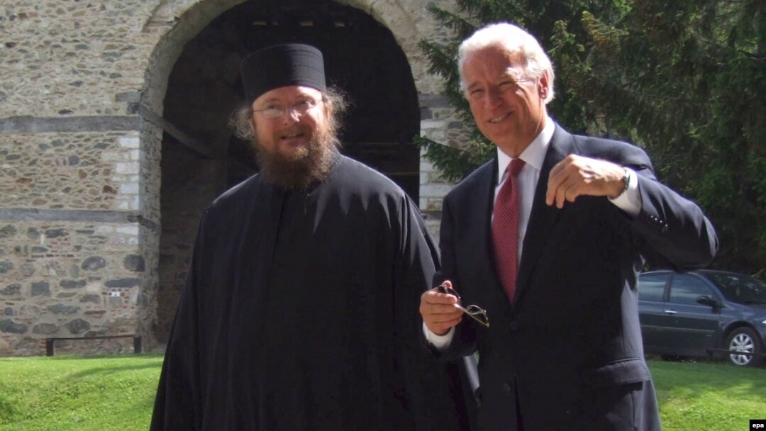 U.S. Vice President Joe Biden (right) talks with father Sava Janjic at the Visoki Decani monastery in May 2009.