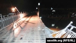 The broken railing on the bridge in the park in the city of Urgench on August 9.