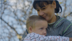 Ukraine -- Olha Puzik and her son Vitya, who was stolen by Russian occupation authorities from Kherson Children's Home. September 2025