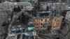 An aerial view shows a residential building heavily damaged by a Russian missile strike in the town of Selydove on February 8.