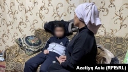 Шахноза с сыном Хотамджоном