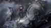 Rescue workers search for survivors amid the wreckage of the passenger plane that crashed in Karachi on May 22.