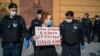 Viktoria Ivleva being detained in May 2020 during a solo protest in support of fellow journalist and activist Ilya Azar outside the police headquarters in Moscow.