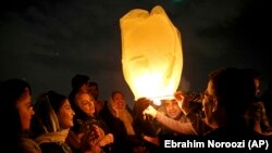 Iranians celebrating the traditional fire and light festival prior to Norooz New Year, in a moment of happiness in the midst of economic crisis. March 19, 2019