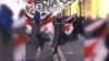 Anti-Government Protesters Dance Through Tbilisi