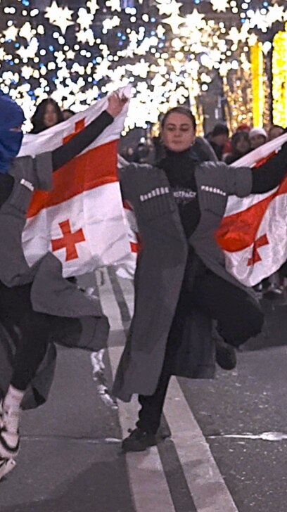Anti-Government Protesters Dance Through Tbilisi