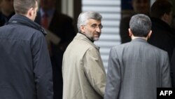 Iran's chief negotiator Said Jalili (center) and the five nations that are part of the UN Security Council plus Germany end nuclear talks on December 7, in Geneva, Switzerland. 